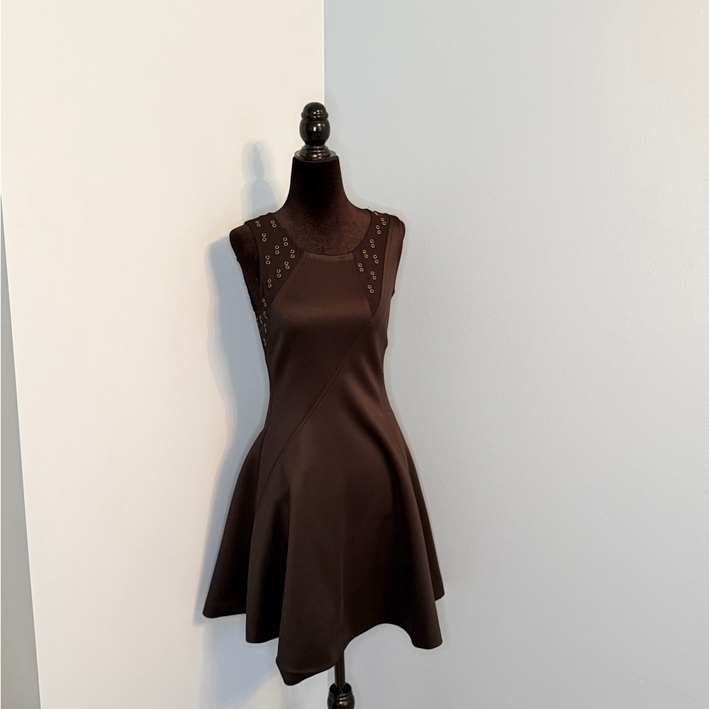 Rachel Roy Black Sleeveless Fit-and-Flare Dress with Grommet Detail.